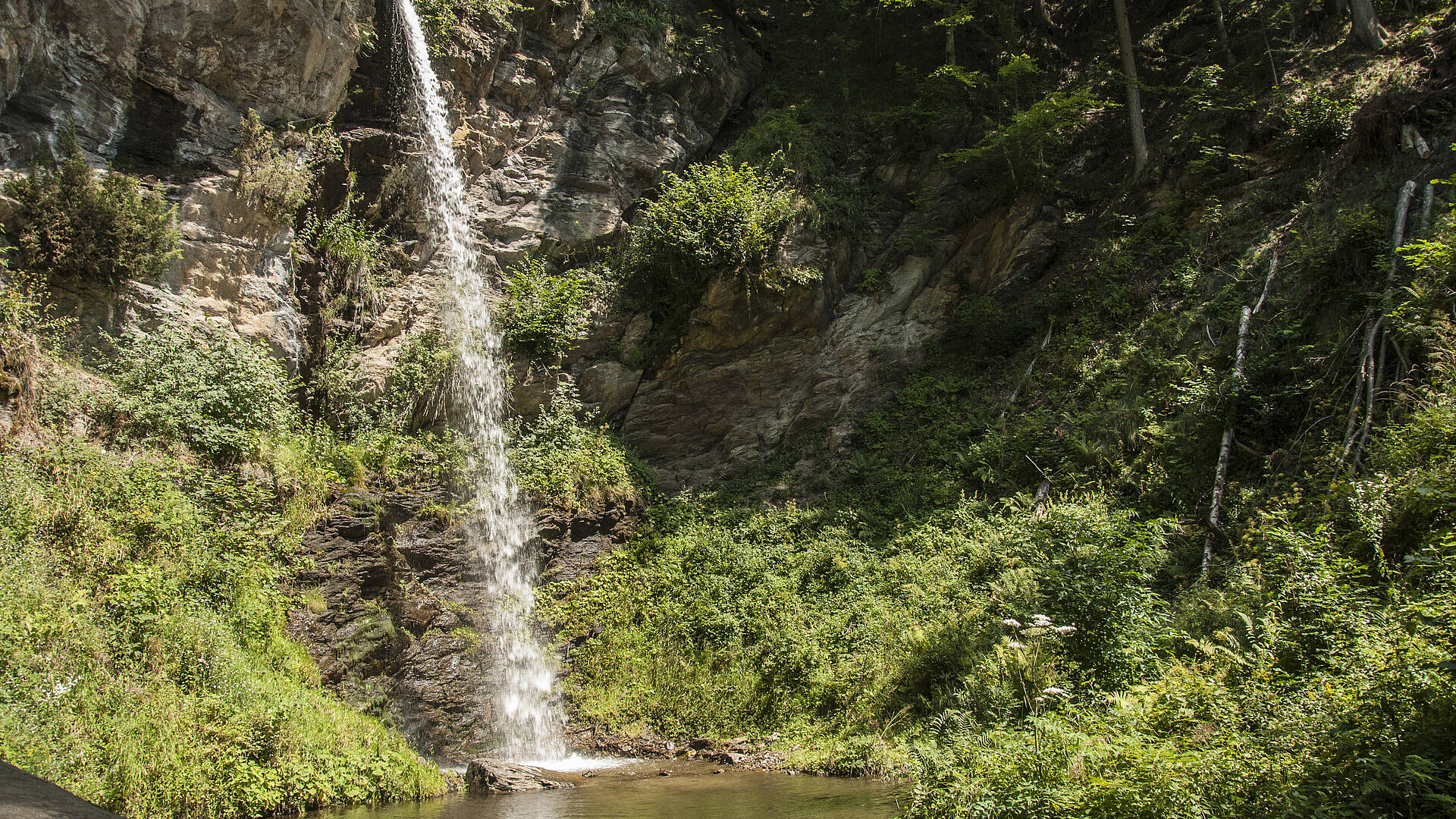 Treffen in der Region Villach mit dem Finsterbach Wasserfall